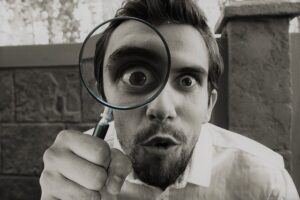inspection-with-magnifying-glass